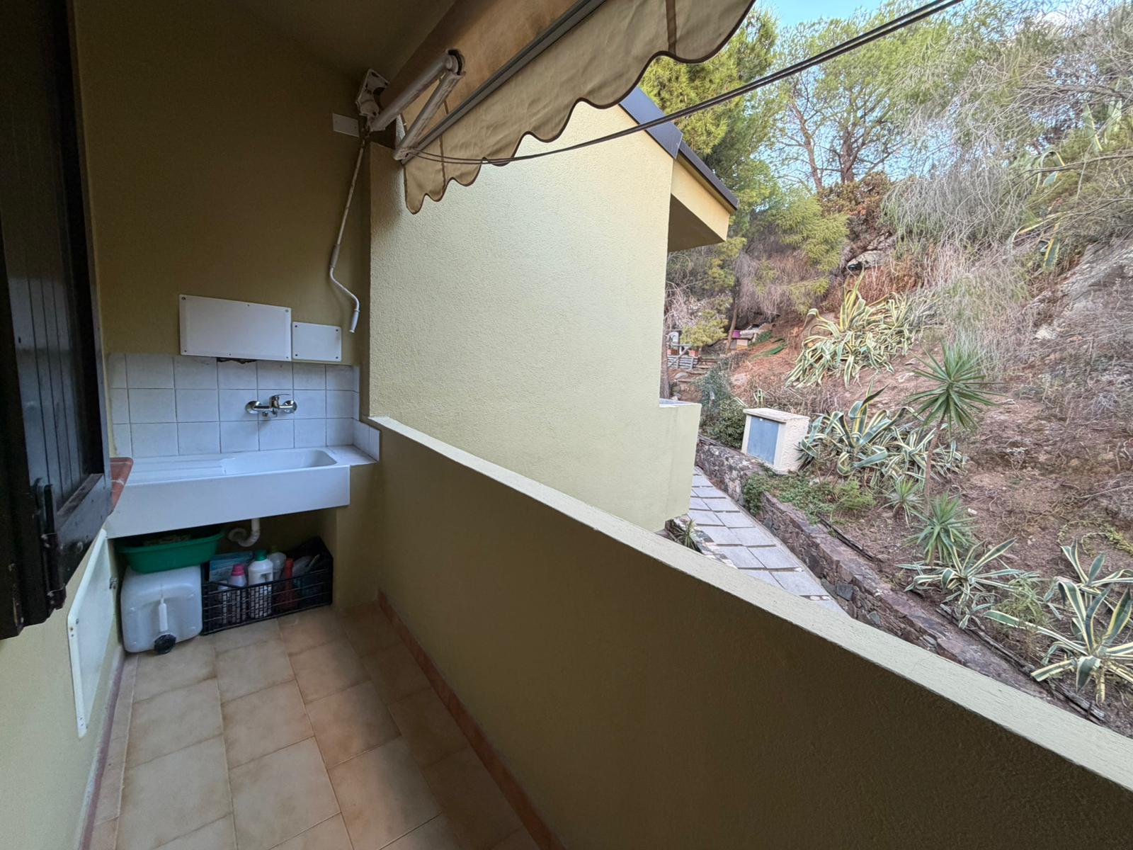 Verandina con lavatoio